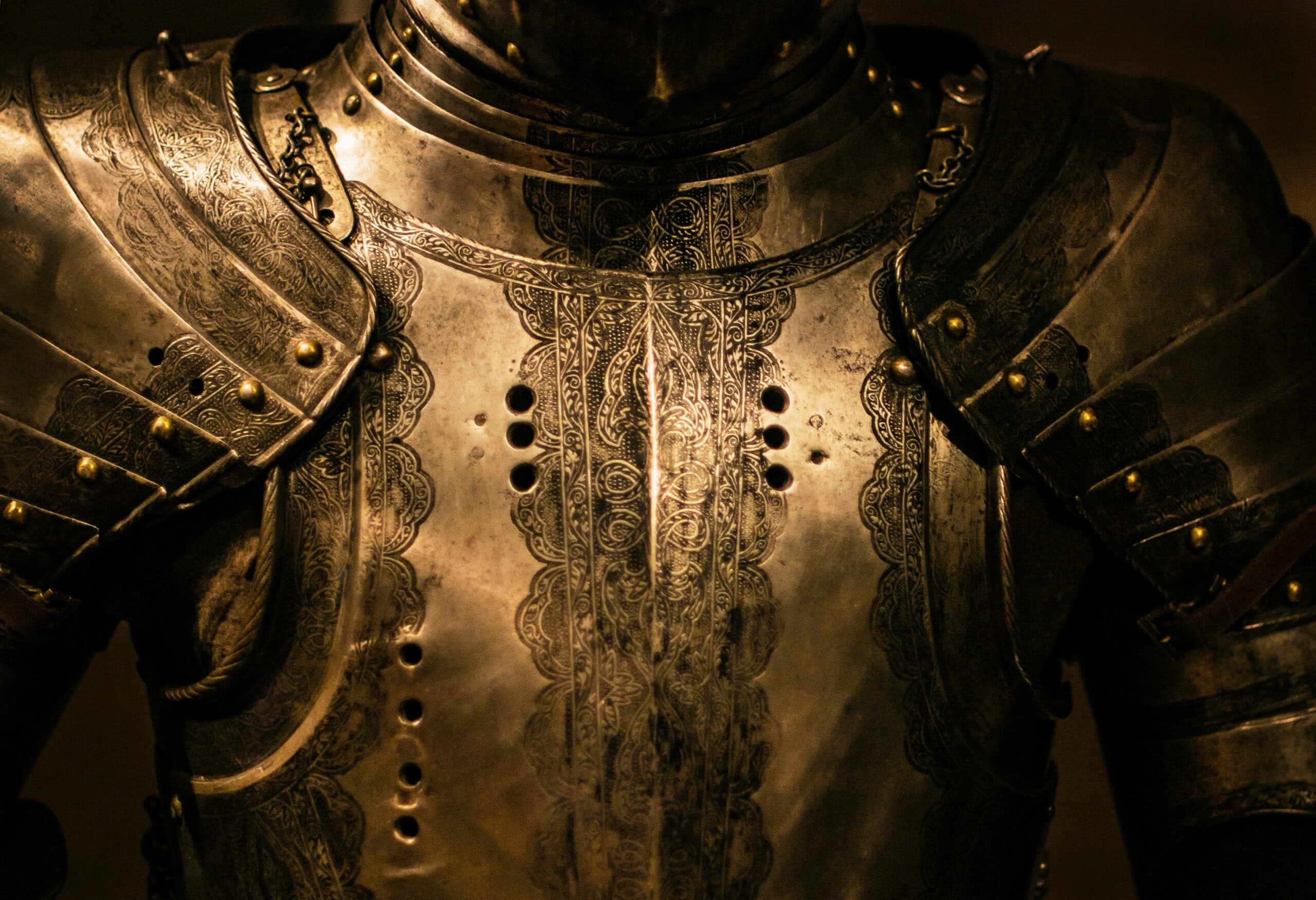 Knight's armored chest plate with a slight glint.